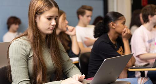 Student in class on laptop